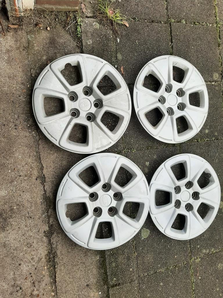 Te koop Origineel Kia wieldoppen 15 inch., Ophalen of Verzenden