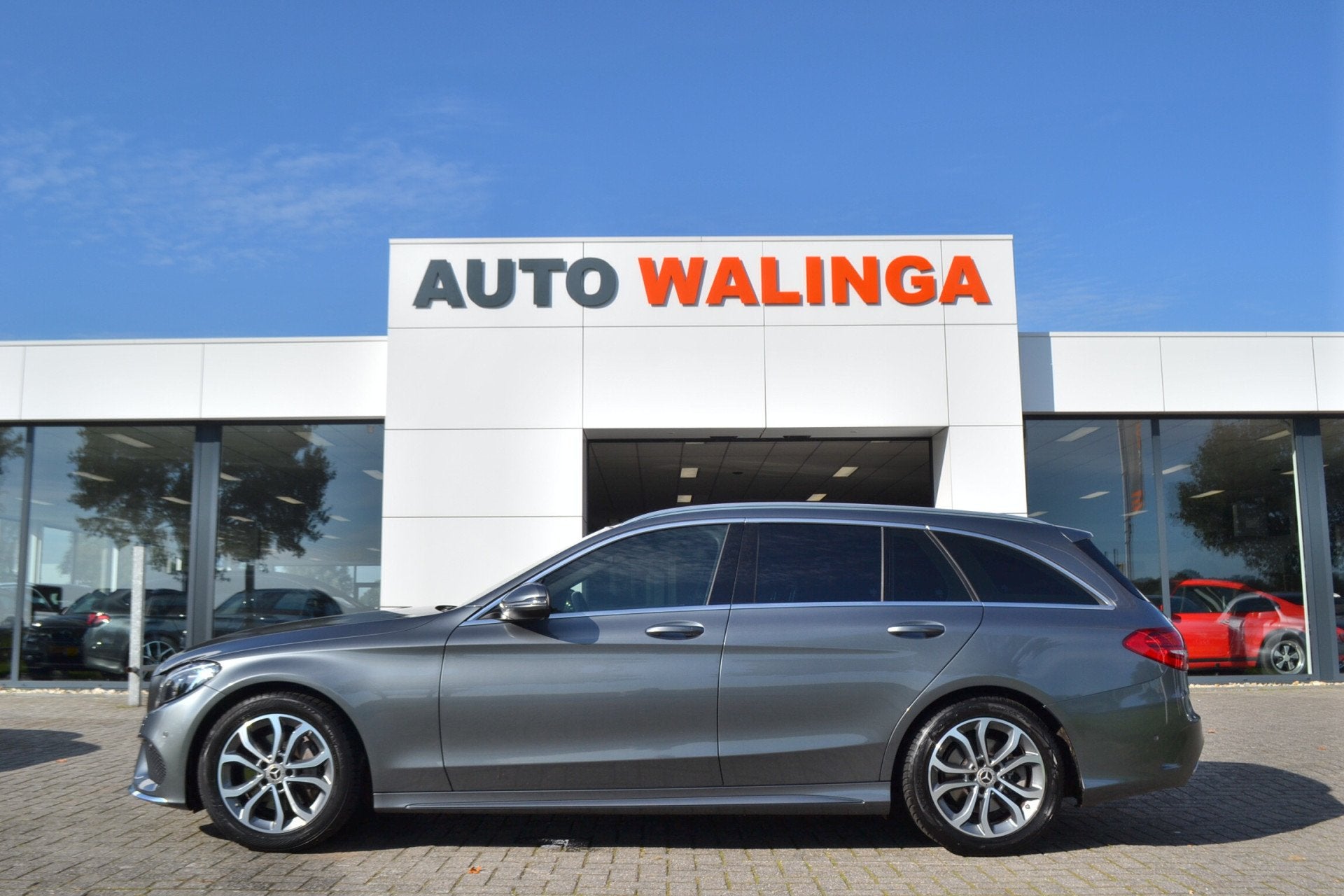 Mercedes-Benz C-Klasse Estate 180 AMG Panoramadak | Leer | C, Auto's, Automaat, Achterwielaandrijving, Parkeerassistent, 750 kg