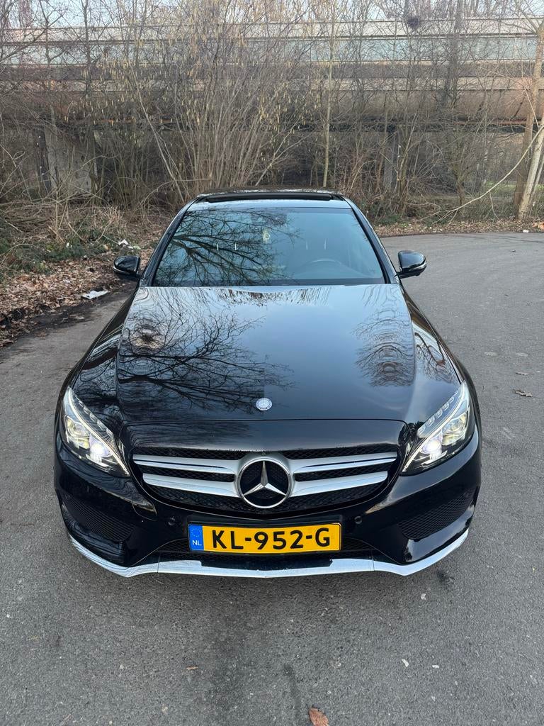 Mercedes-Benz C-Klasse C200 2.0 135KW Aut7 2016 Zwart, Auto's, 1800 kg, Zwart, 4 cilinders, Parkeerassistent