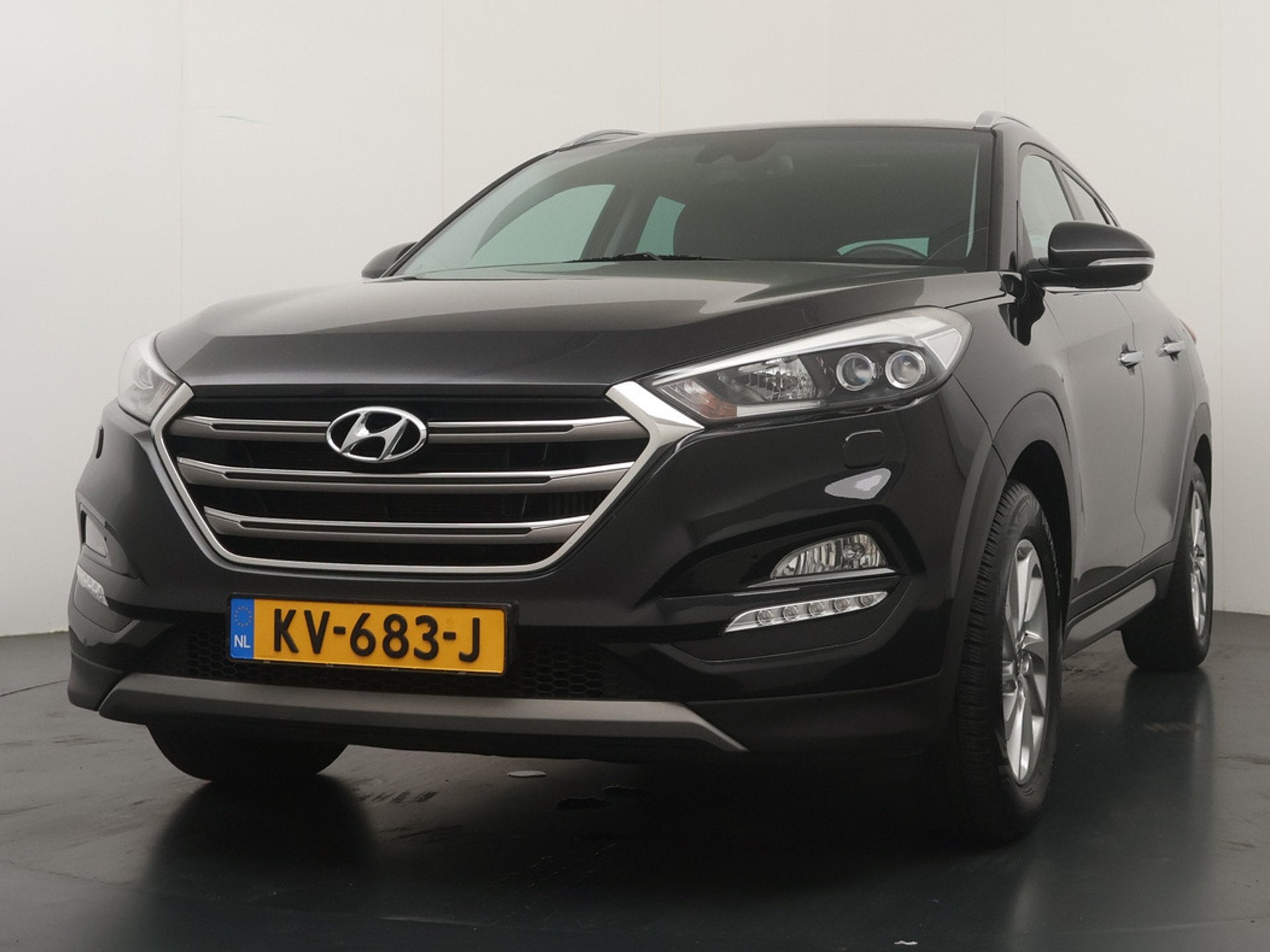 Hyundai Tucson 1.6 T-GDi Premium - Navigatie - Achteruitrijc, Auto's, Voorwielaandrijving, Gebruikt, 4 cilinders, Zwart