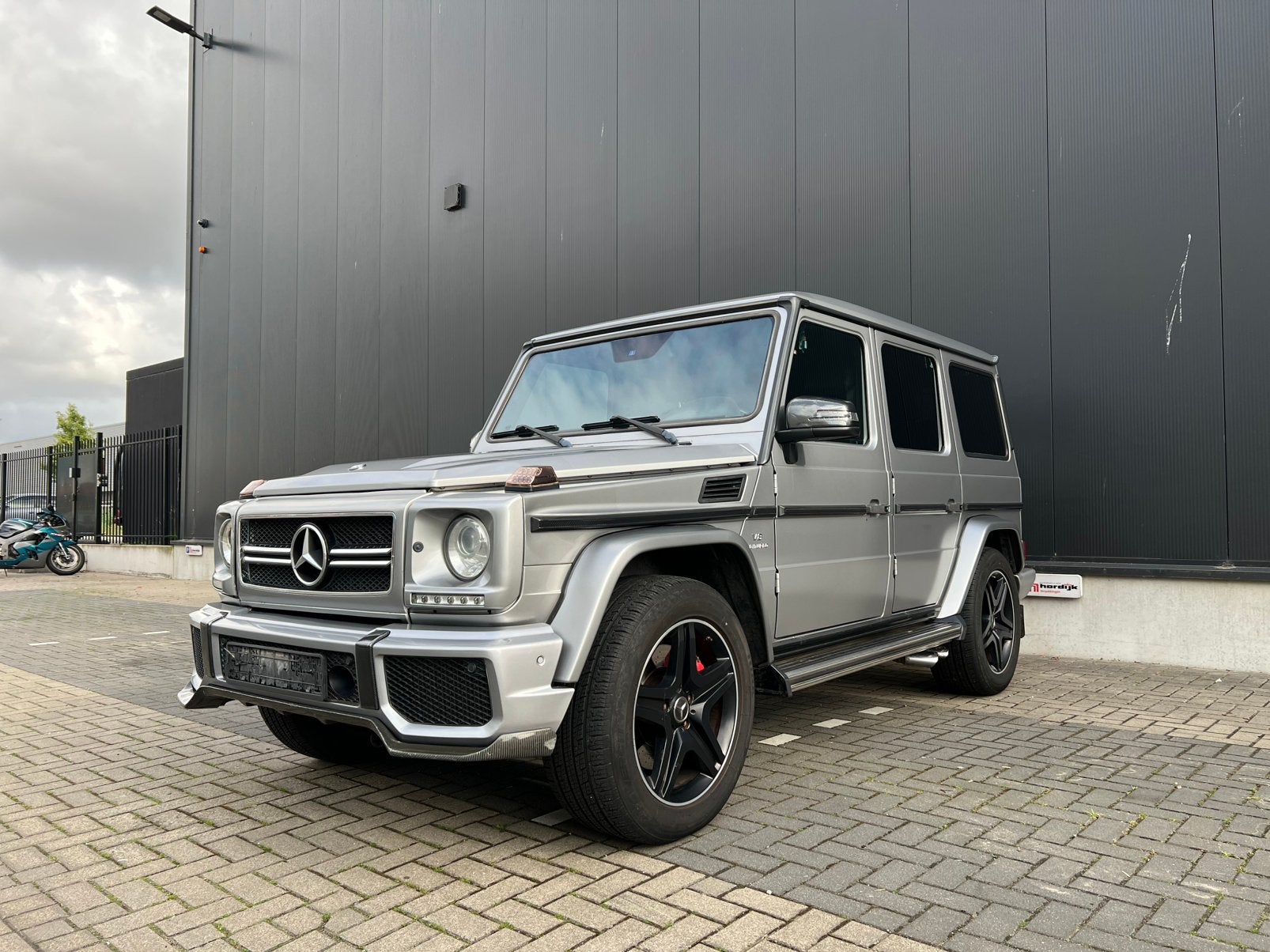 Mercedes G63 AMG|Designo|Schuifdak|H&K|ACC|Carbon|Ventilatie, Automaat, Euro 5, G-Klasse, Vierwielaandrijving