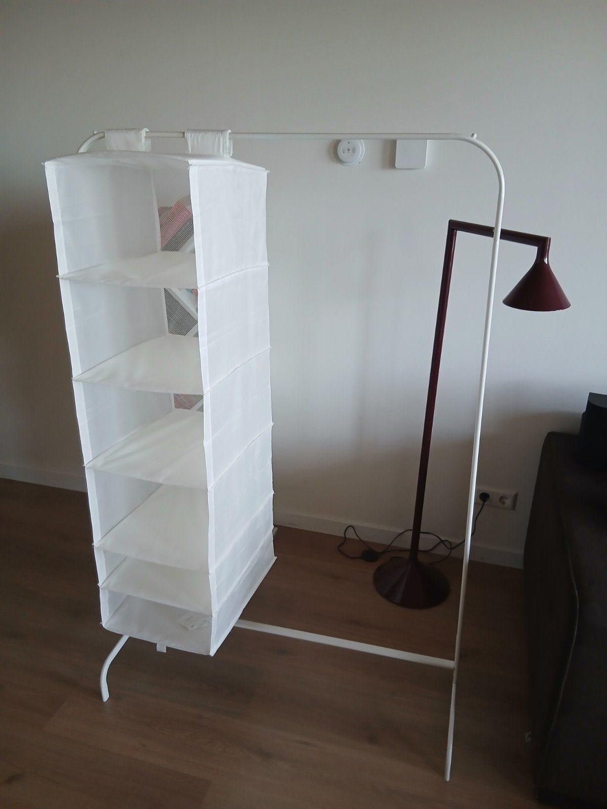 Kledingrek met opberger, Ophalen