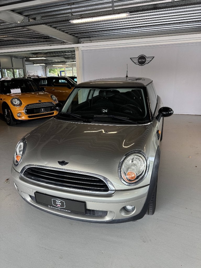 Mini 1.4 16V ONE 2007 Champagne ( 3 MAANDEN GARANTIE ), Auto's, Voorwielaandrijving, Stof, Zwart, 4 stoelen