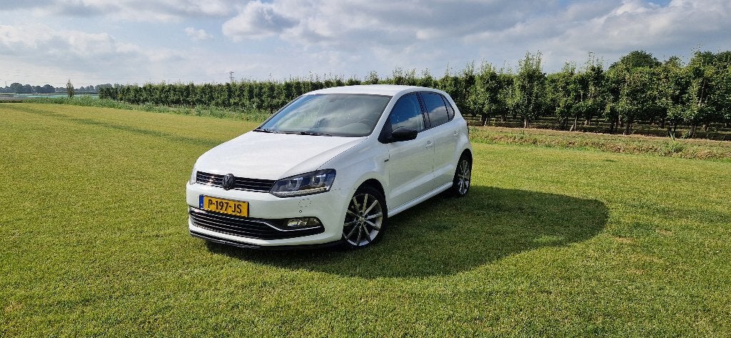 Volkswagen Polo 1.2 TSI 66KW 2014 Wit, Stof, 40 €/maand, Zwart, 4 cilinders