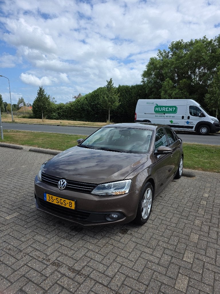 Volkswagen Jetta 1.2TSI 77KW H6 2011 Bruin, Voorwielaandrijving, Euro 5, Stof, Zwart