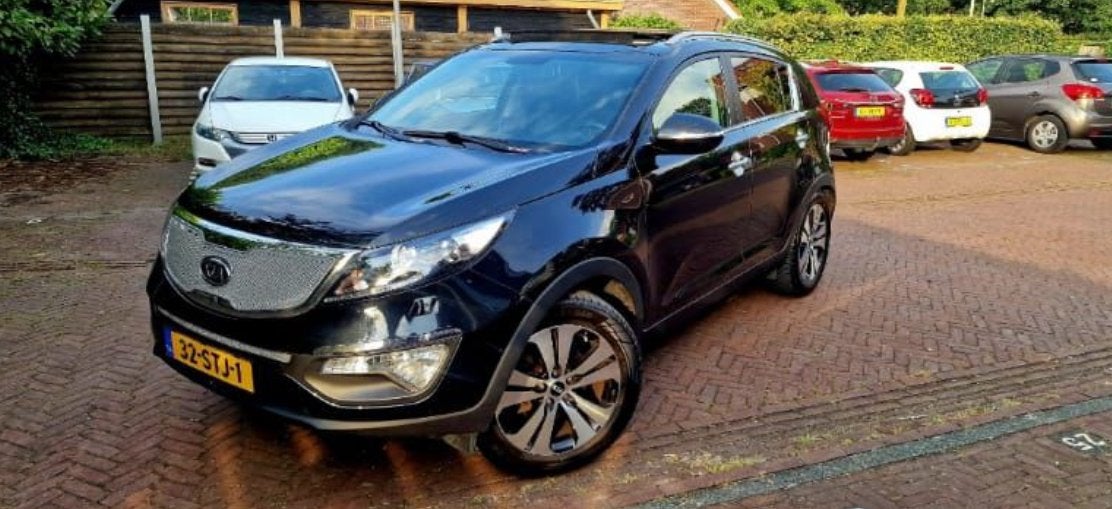 Kia Sportage 2.0 Cvvt 2WD AUT 2012 Zwart, Auto's, Kia, 1998 cc, 4 cilinders, Origineel Nederlands, 75 €/maand