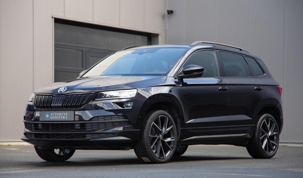 Skoda Karoq 1.5 TSI ACT Sportline Business |Panorama|Virtual, Auto's, Skoda, Stof, 4 cilinders, 150 pk, Zwart
