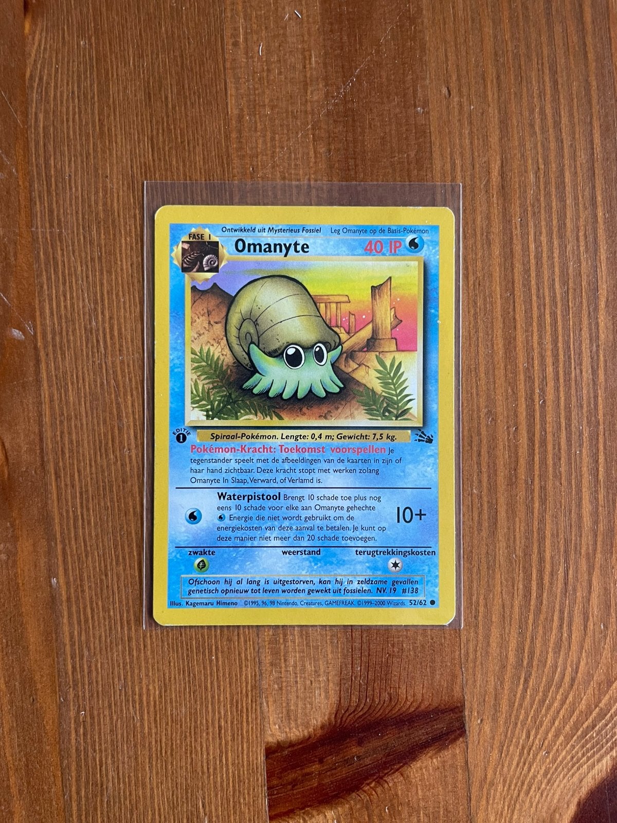 Omanyte 52/62 First Edition Fossil - LP, Ophalen of Verzenden, Gebruikt, Losse kaart