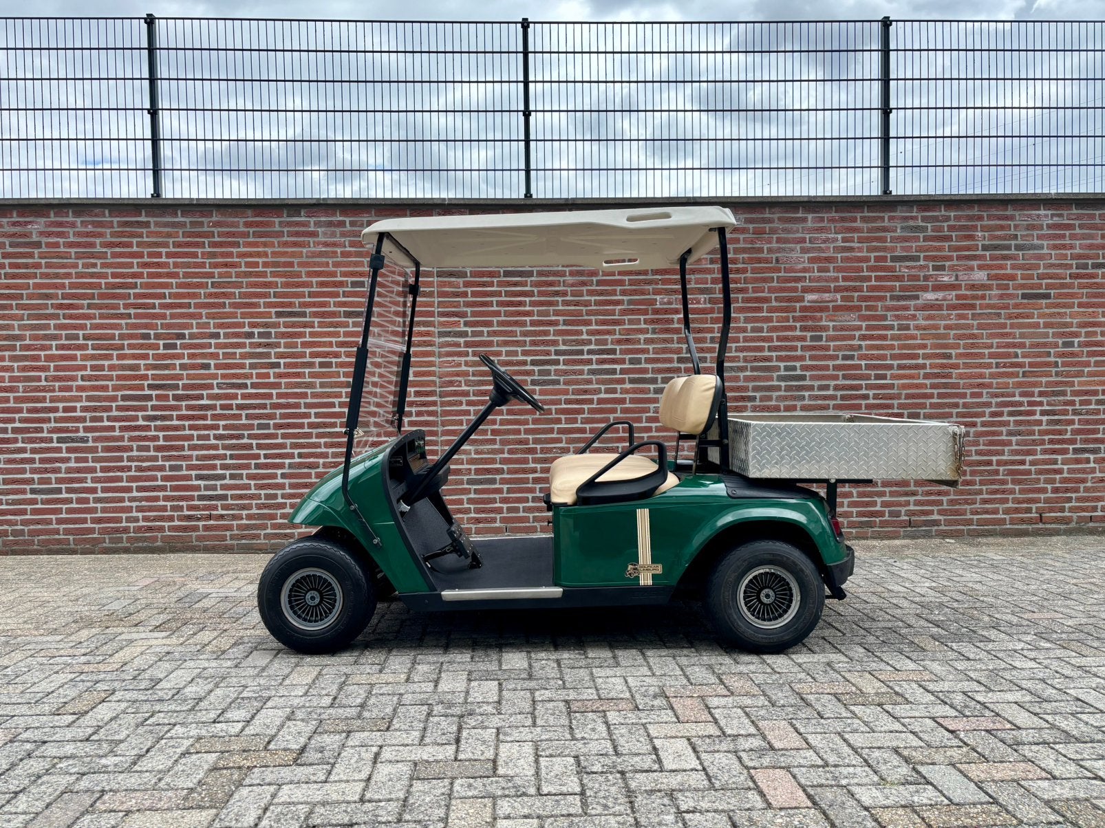 Prachtige Benzine Ezgo Golfkar met Werkbak, Ophalen of Verzenden, Zo goed als nieuw, Golfkar
