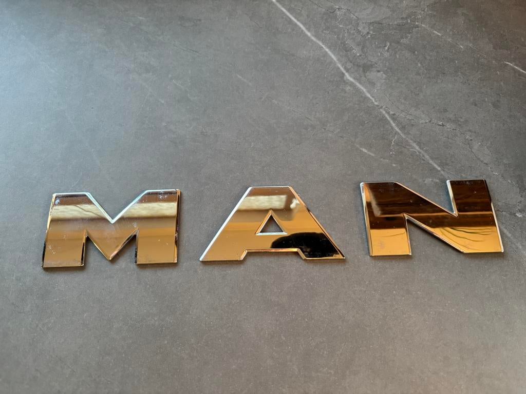 MAN LETTERS LOGO EMBLEEM, Ophalen of Verzenden