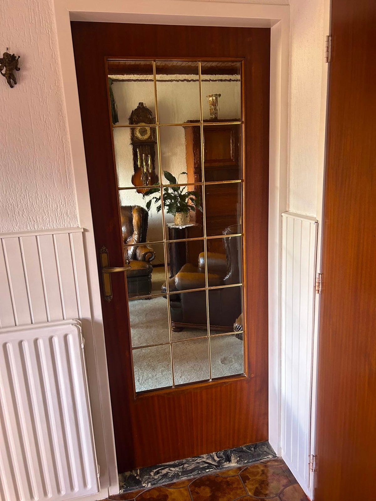 Glas in lood tussendeur, Ophalen