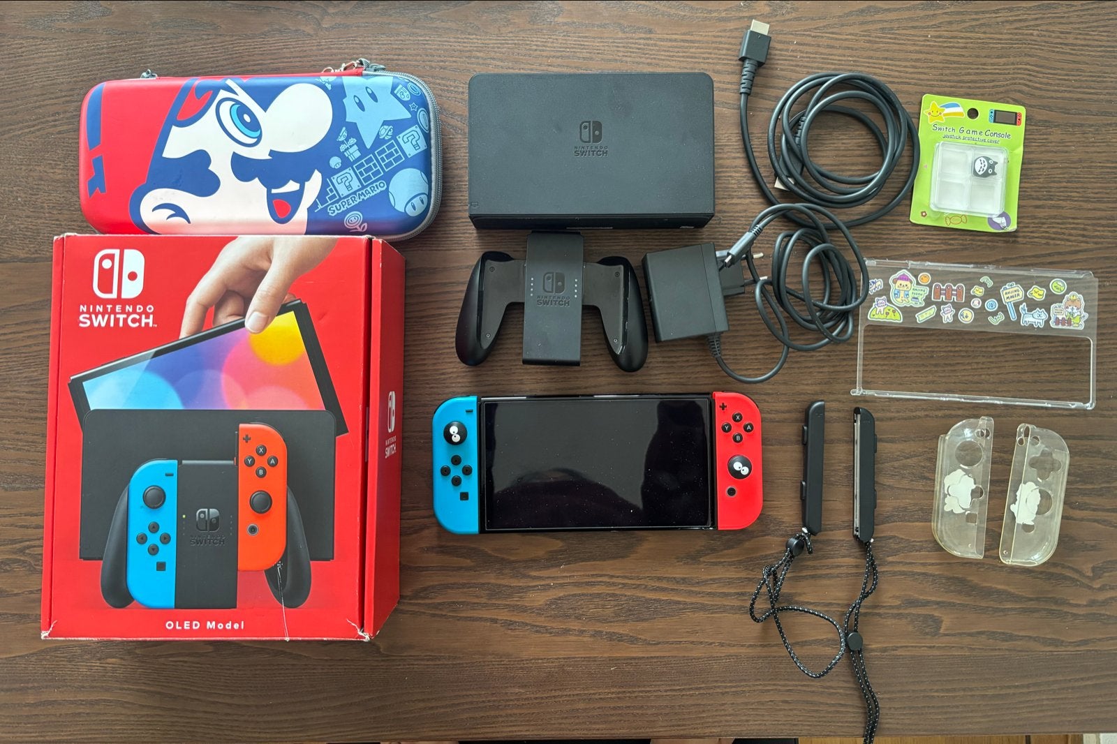Nintendo Switch OLED Model met accessoires, Spelcomputers en Games, Ophalen of Verzenden, Zo goed als nieuw, Met 1 controller