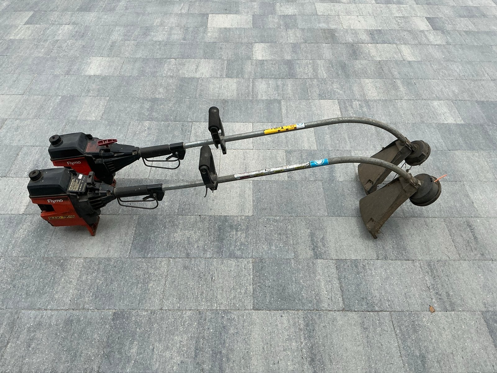2x Flymo Maxi Trim grastrimmers - voor onderdelen, Ophalen, Gebruikt, Benzine
