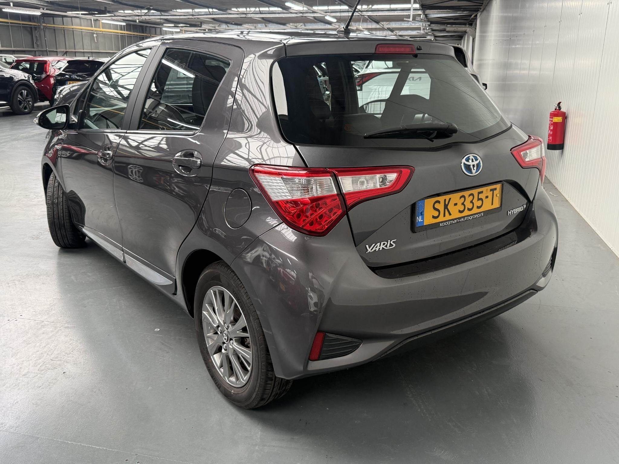 Toyota Yaris 1.5 Hybrid Executive 1e eigenaar dealer onderho, Gebruikt, Euro 6, 4 cilinders, 49 €/maand