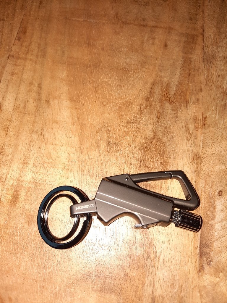 Honest sleutelhanger met aansteker en flesopener., Verzenden, Nieuw, Merk