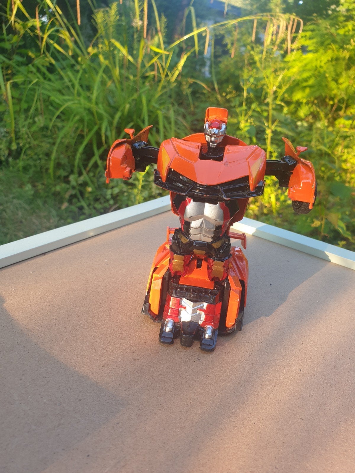 Oranje Transformer Speelgoedauto - Robot, Kinderen en Baby's, Speelgoed | Speelgoedvoertuigen, Ophalen of Verzenden, Gebruikt