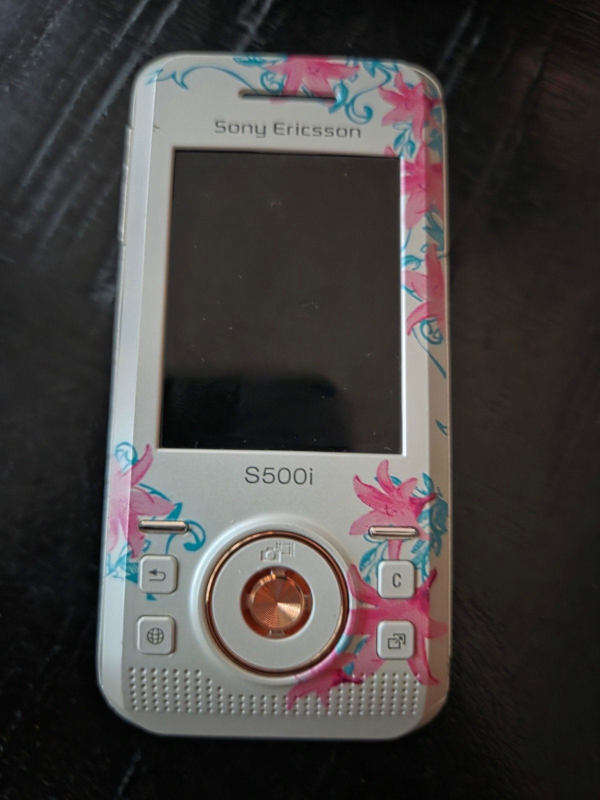 Sony Ericsson S500i - Retro schuiftelefoon met bloemenprint, Telecommunicatie, Mobiele telefoons | Overige merken, Gebruikt, Schuifmodel