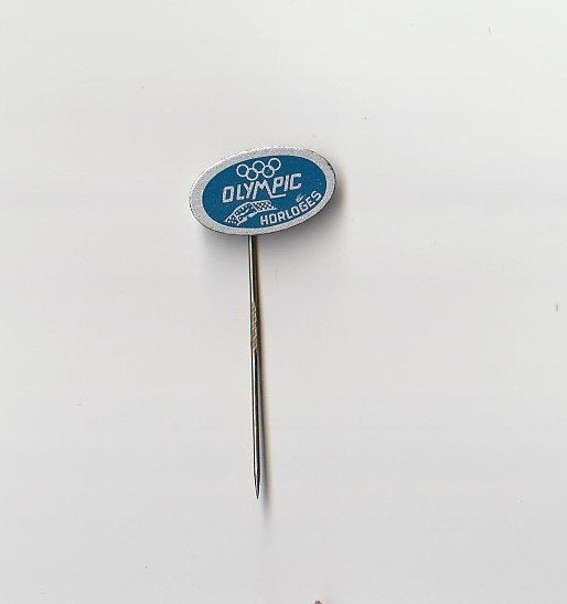 dikblik speld Olympic horloges, Ophalen of Verzenden, Overige onderwerpen, Speldje of Pin