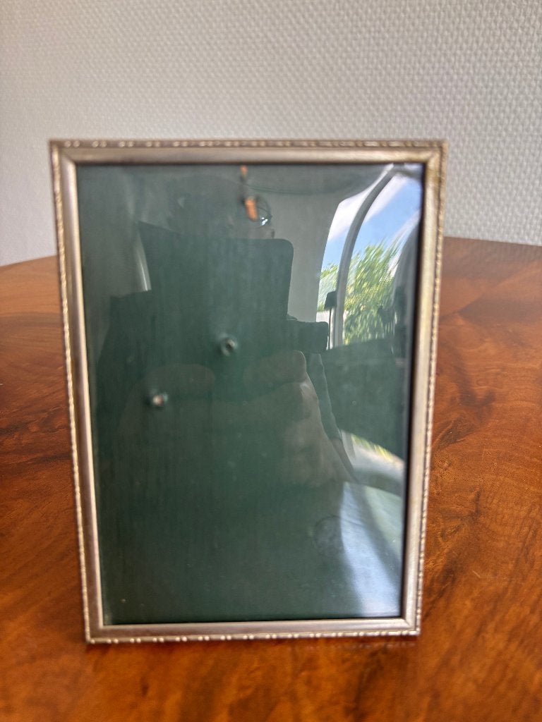 Vintage fotolijst Jyden met metalen lijst en bol glas 10*15., Ophalen of Verzenden