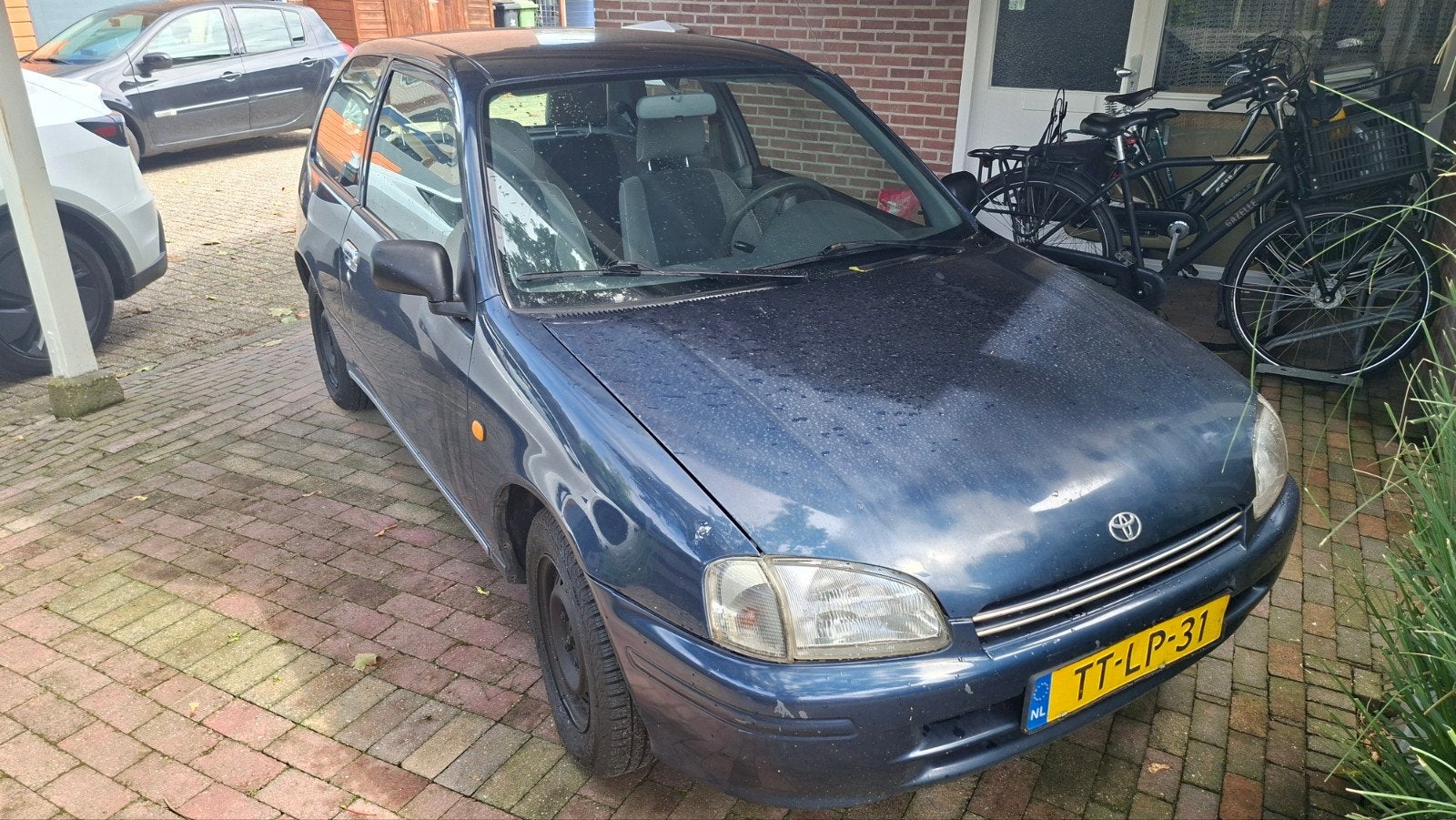 Toyota Starlet 1.3 16V 1998 Blauw, Auto's, 15 km/l, 74 pk, 4 cilinders, Starlet