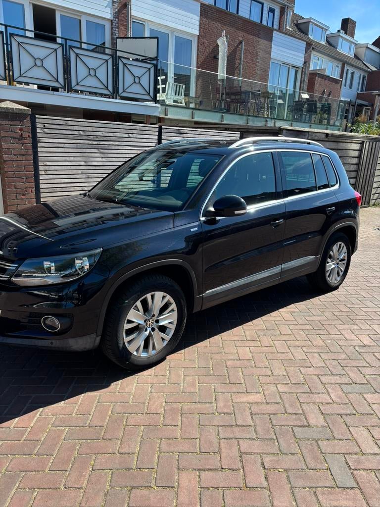 Volkswagen Tiguan 1.4 TSI 90KW BMT 2013 Zwart, Auto's, Volkswagen, Voorwielaandrijving, Euro 5, Zwart, 4 cilinders