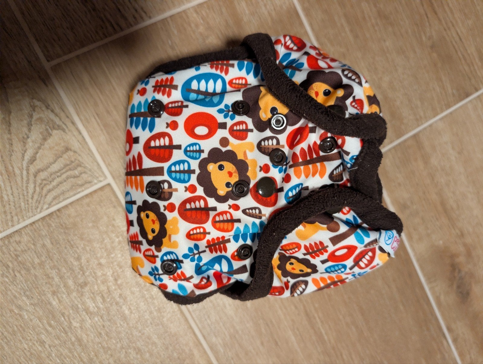 Petit Lulu overbroekje drukknoopjes + fleece randjes Leeuw, Ophalen of Verzenden, Zo goed als nieuw