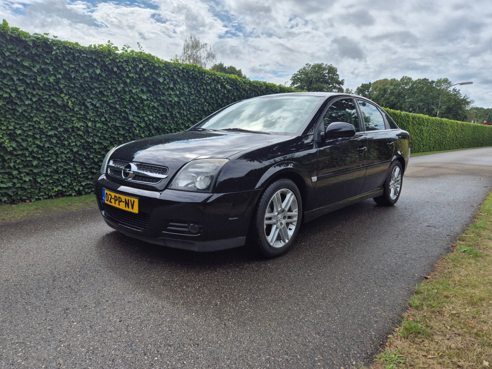 Opel Vectra GTS 2.2-16V Elegance, Gebruikt, Zwart, 715 kg, Leder en Stof