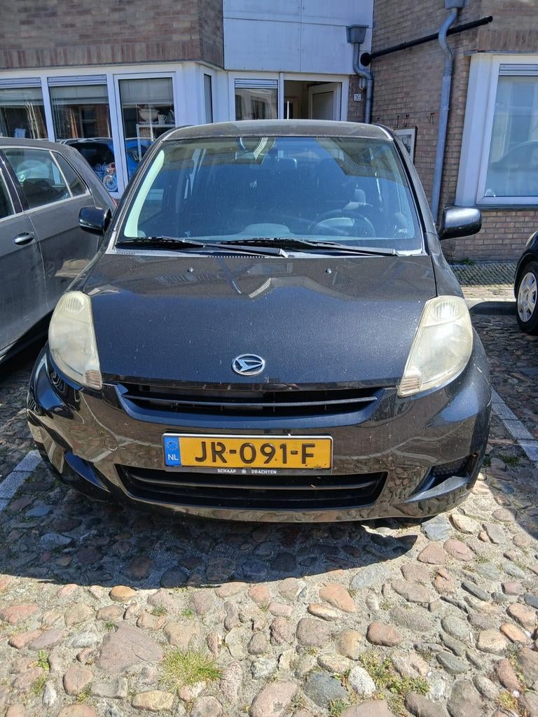 Daihatsu Sirion, zwart metalic,, Auto's, Daihatsu, Automaat, Stof, Zwart, Zwart