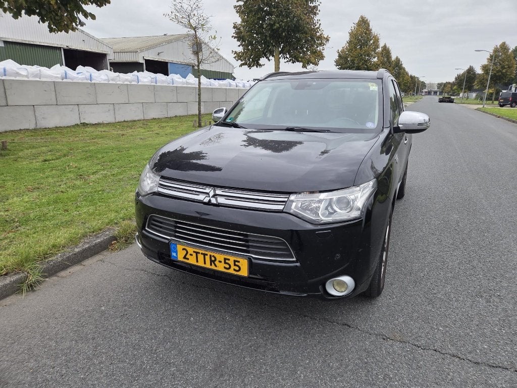 Mitsubishi Outlander 2.0 Dohc Mivec Phev 203pk 4WD CVT 5P, Auto's, Outlander, Zwart, 4 cilinders, Zwart
