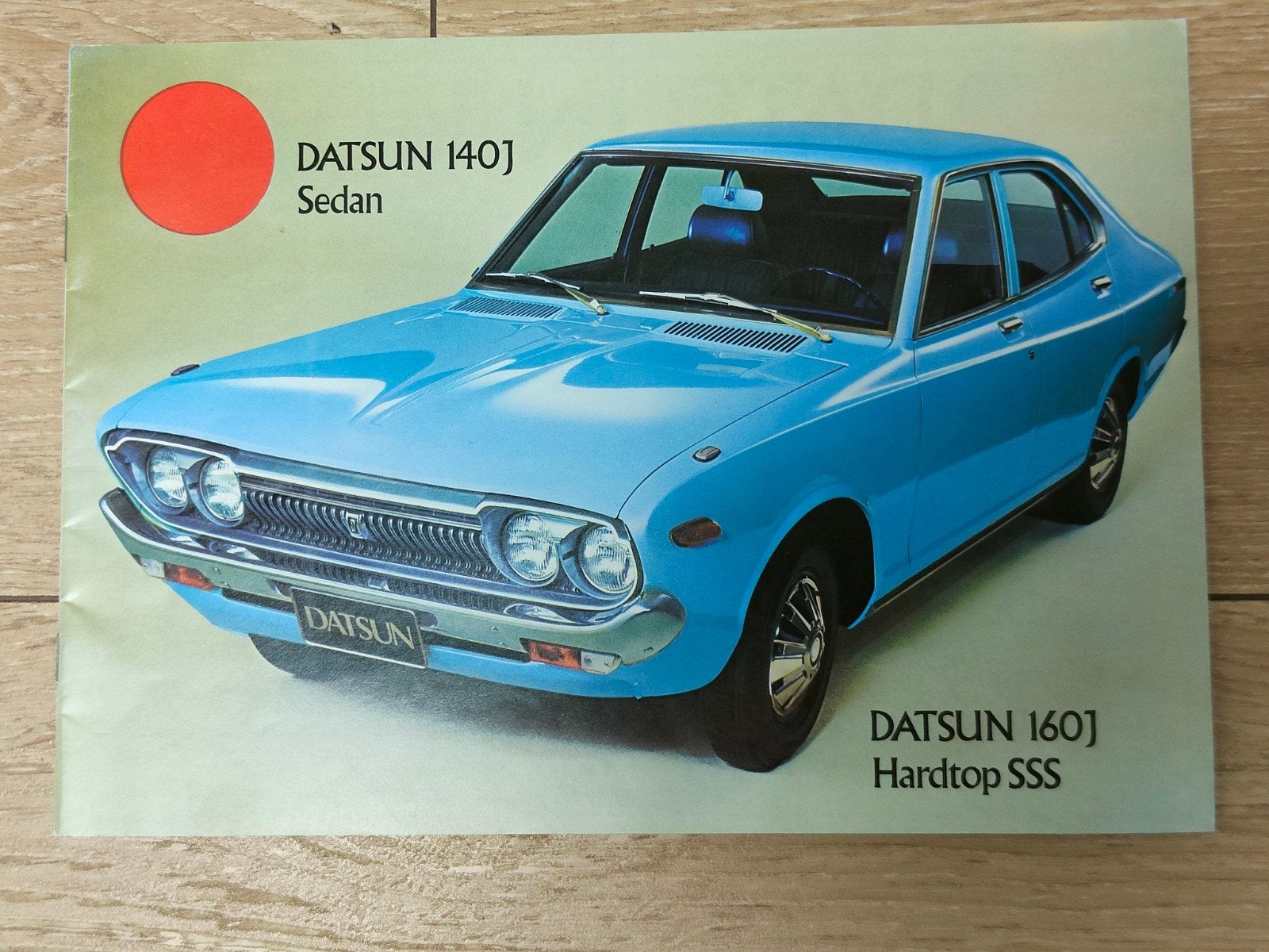 Autofolder Datsun 140J/160J Hardtop SSS, Ophalen of Verzenden, Zo goed als nieuw, Nissan