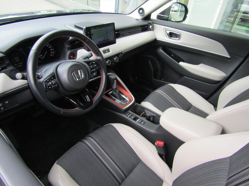 Honda HR-V 1.5 i-MMD 131pk CVT Advance Style, Auto's, Honda, Blauw, Leder en Stof, Bedrijf, 19 km/l