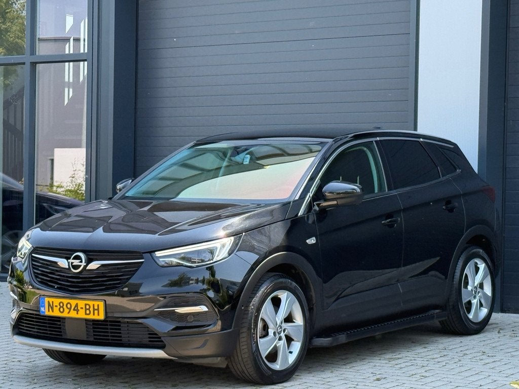 Opel Grandland X 1.2 Turbo Ultimate/ BTW AUTOMAAT / CAMERA, Auto's, Gebruikt, Euro 6, 1199 cc, Zwart