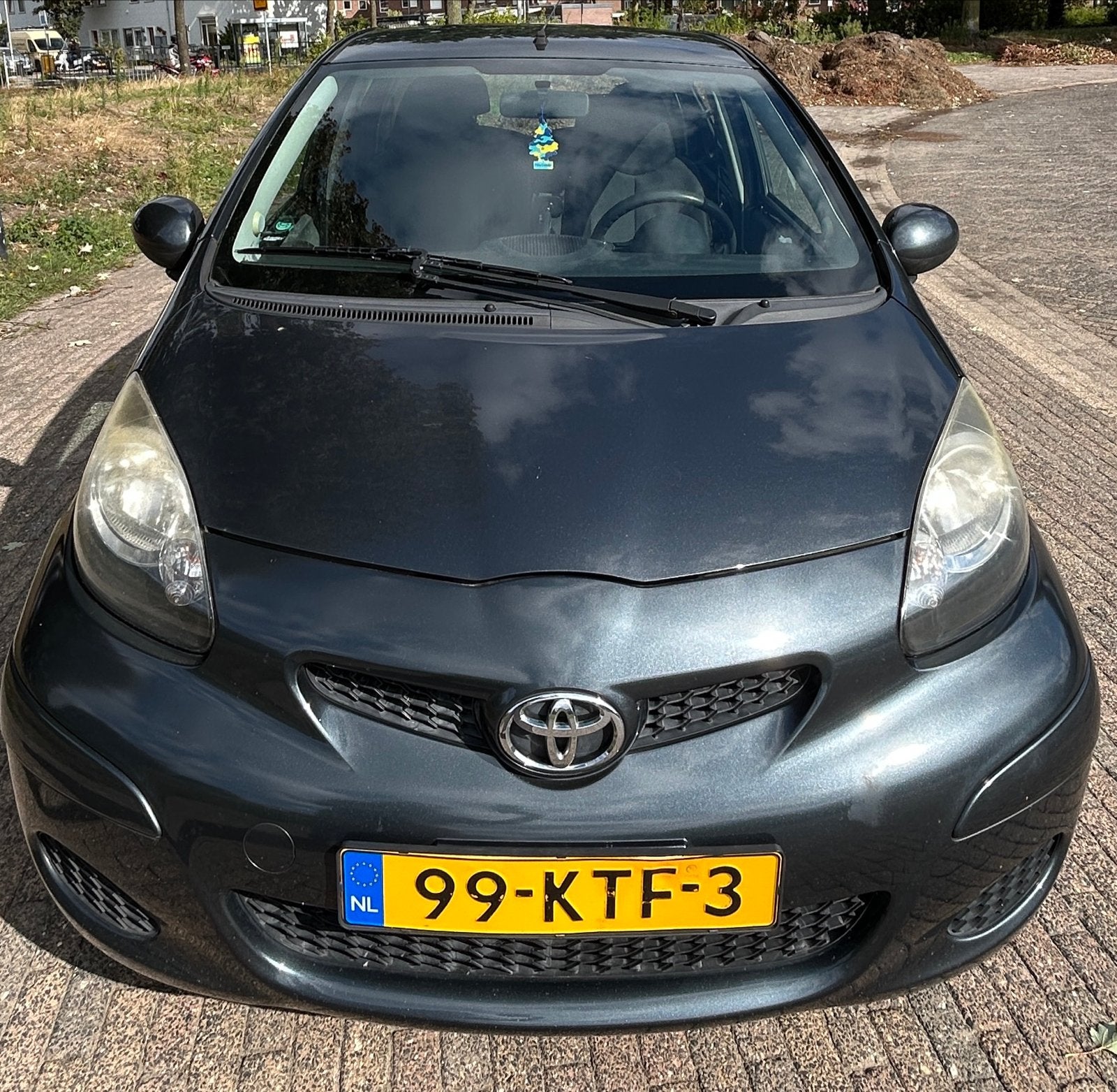 Toyota Aygo 1.0 12V Vvt-i 5DRS 2010 Grijs, Auto's, Voorwielaandrijving, 4 stoelen, 68 pk, Origineel Nederlands