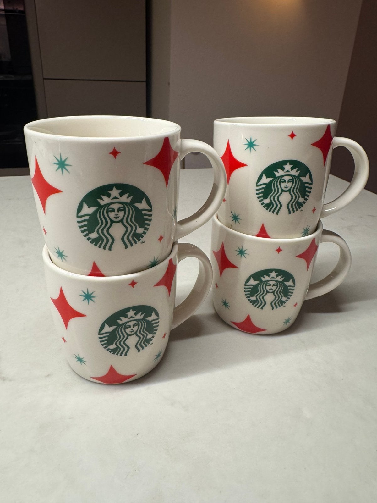 Starbucks koffie kopjes (4x), Huis en Inrichting, Keuken | Servies, Ophalen of Verzenden, Zo goed als nieuw, Overige stijlen, Kop(pen) en/of Schotel(s)