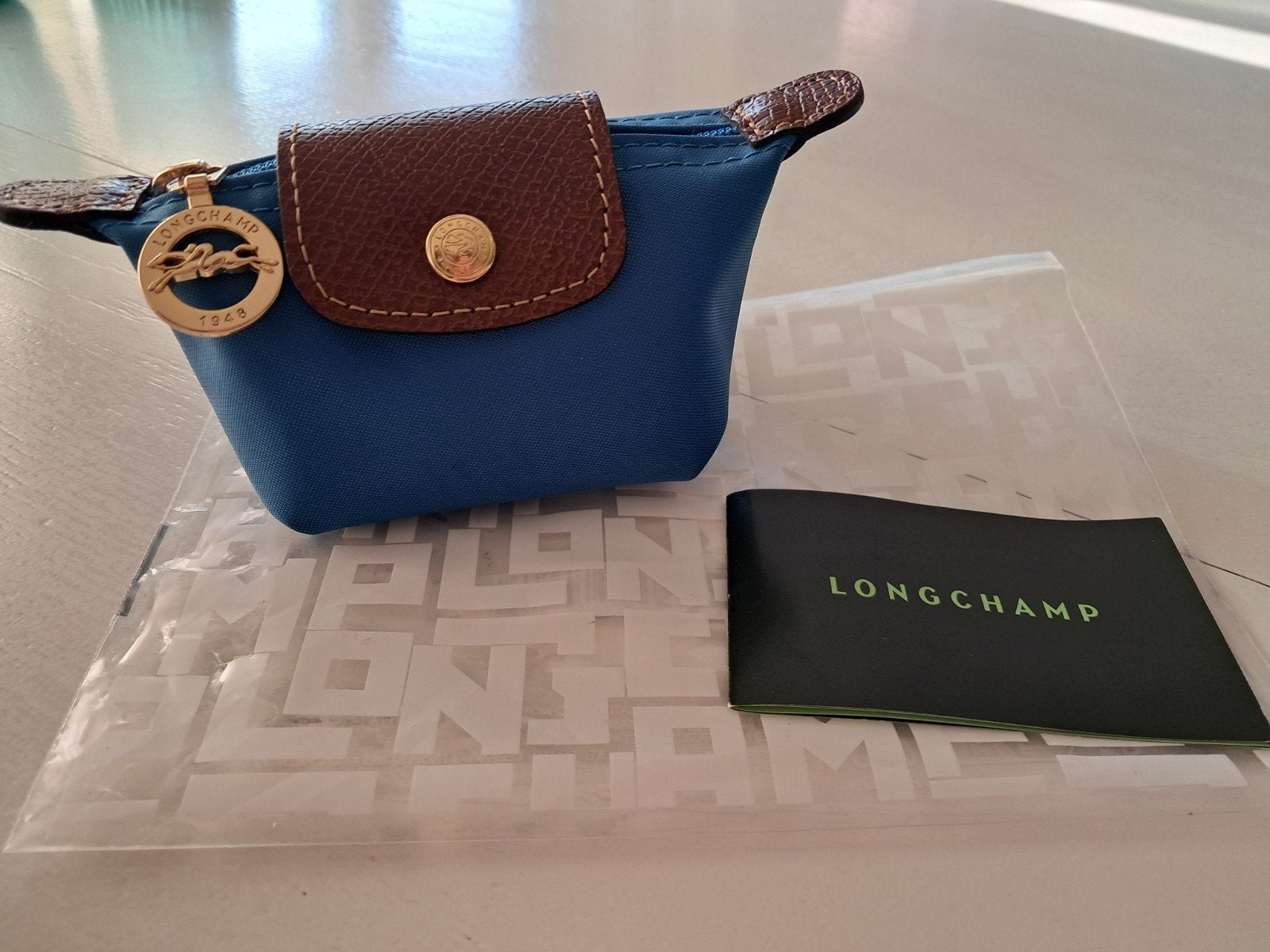 Longchamp Le Pliage muntbeursje, Ophalen of Verzenden, Zo goed als nieuw, Blauw, Overige typen
