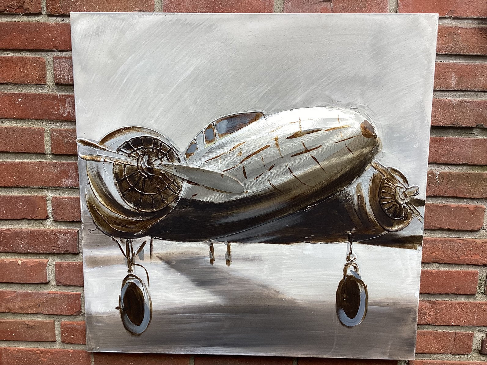 Schilderij 3d op linnen van oud vliegtuig met metalen delen, Ophalen, Zo goed als nieuw, 50 tot 75 cm, Schilderij