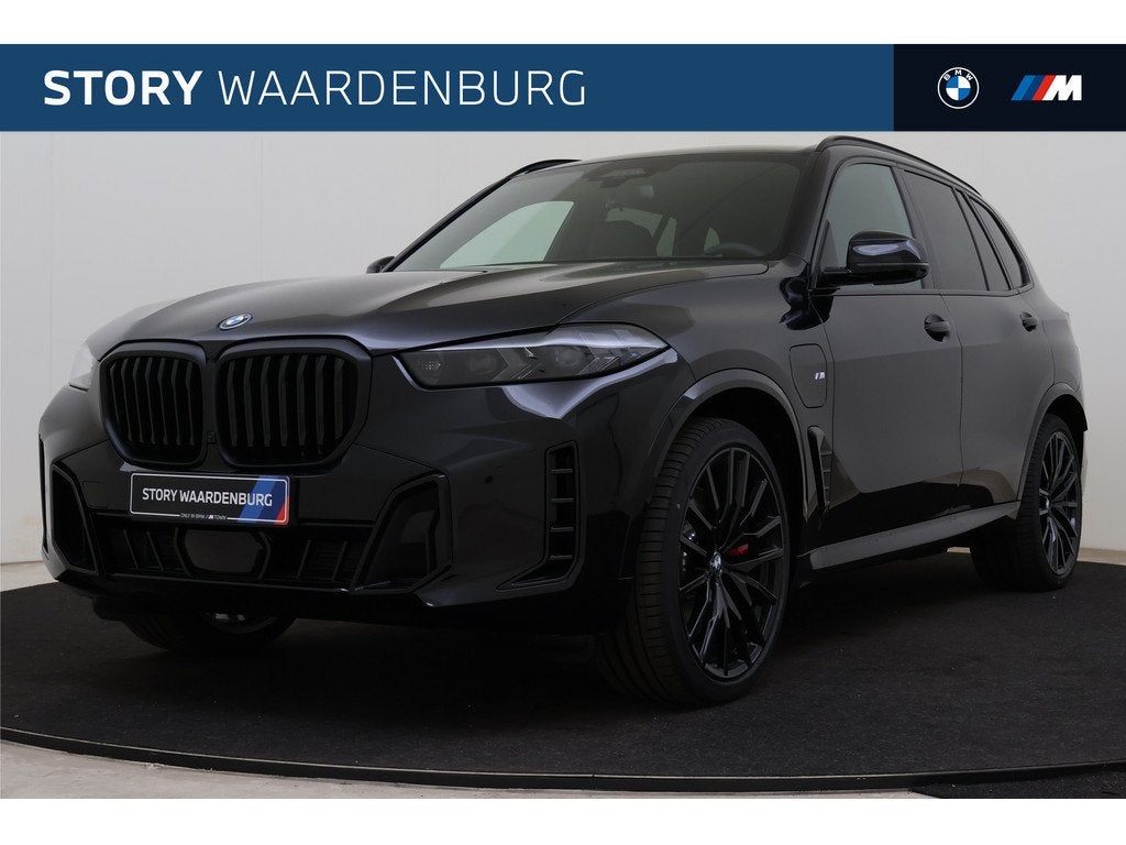BMW X5 xDrive50e M Sport Automaat / Trekhaak / Panoramadak S, Auto's, BMW, Automaat, 2395 kg, Zwart, Leder