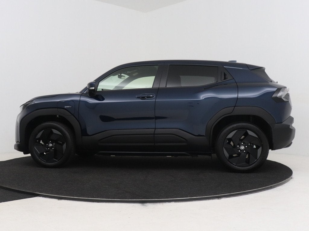 Toyota Urban Cruiser Dynamic 61 kWh (bj 2026, automaat), 12 maanden, Stof, Automatische klimaatregeling, Blauw