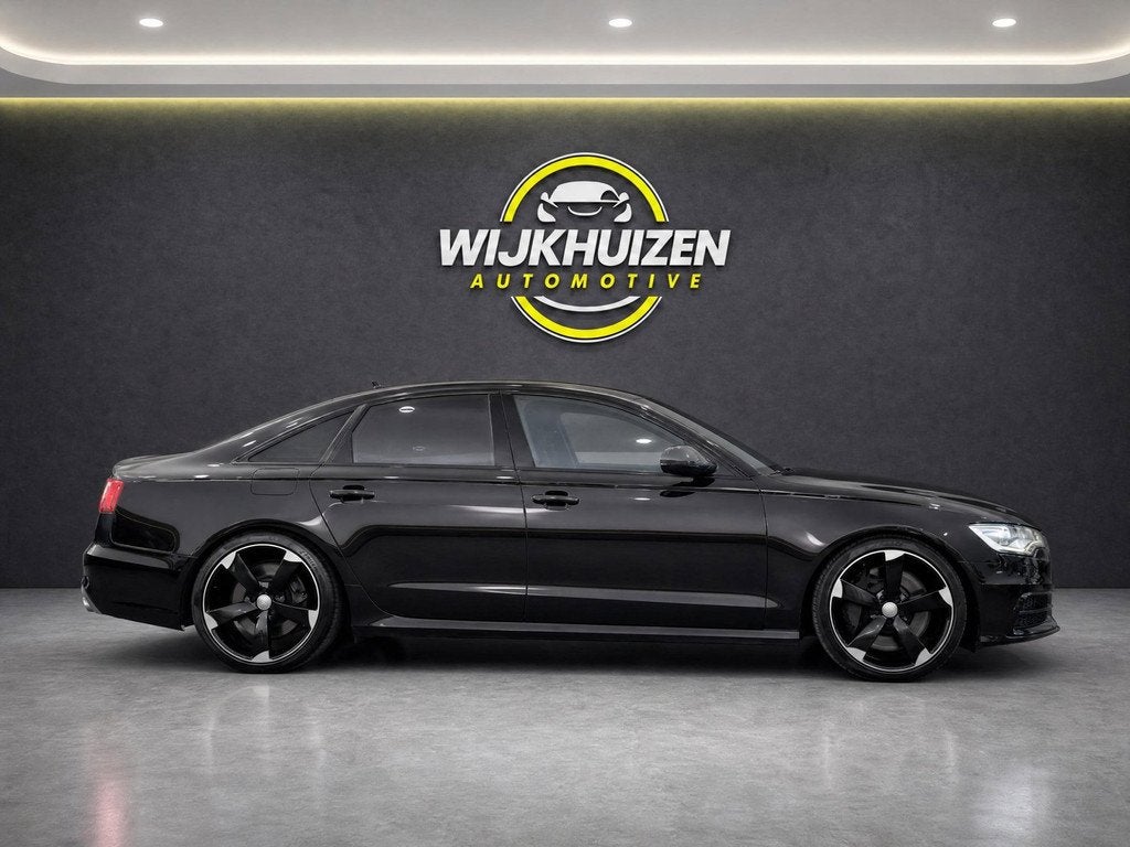 Audi A6 Limousine 4.0 TFSI S6 quattro Pro Line Plus met RS S, Auto's, Audi, Automaat, Euro 5, Gebruikt, Zwart