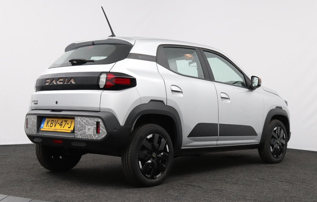 Dacia Spring Extreme 65 26.8 kWh | DC Lader | Noodlaadkabel, Auto's, Dacia, Huisgarantie, Met garantie (alle), 4 stoelen, Leder en Stof