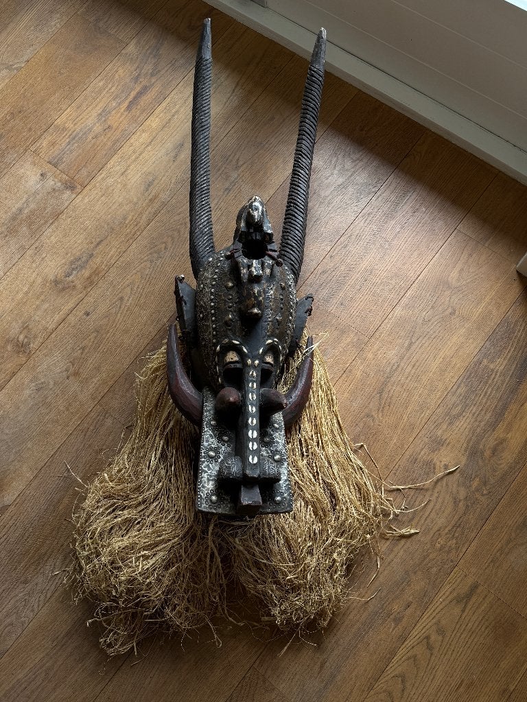 Senufo firespitter mask Ivoorkust, Ophalen
