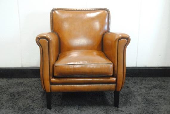 Schapenleren fauteuil., Huis en Inrichting, Fauteuils, Nieuw, Leer, 50 tot 75 cm, 75 tot 100 cm, Ophalen