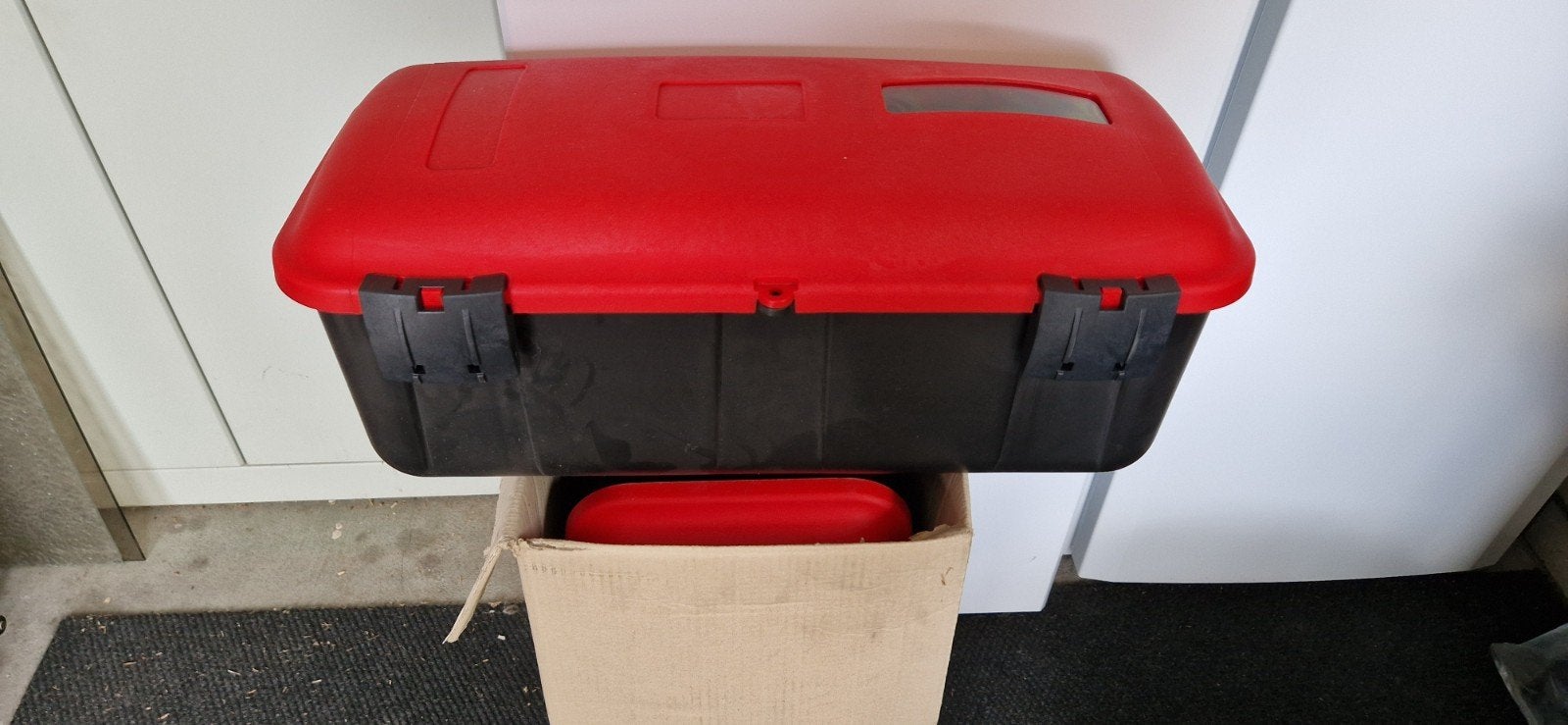 Koffer voor brandblusser, Ophalen