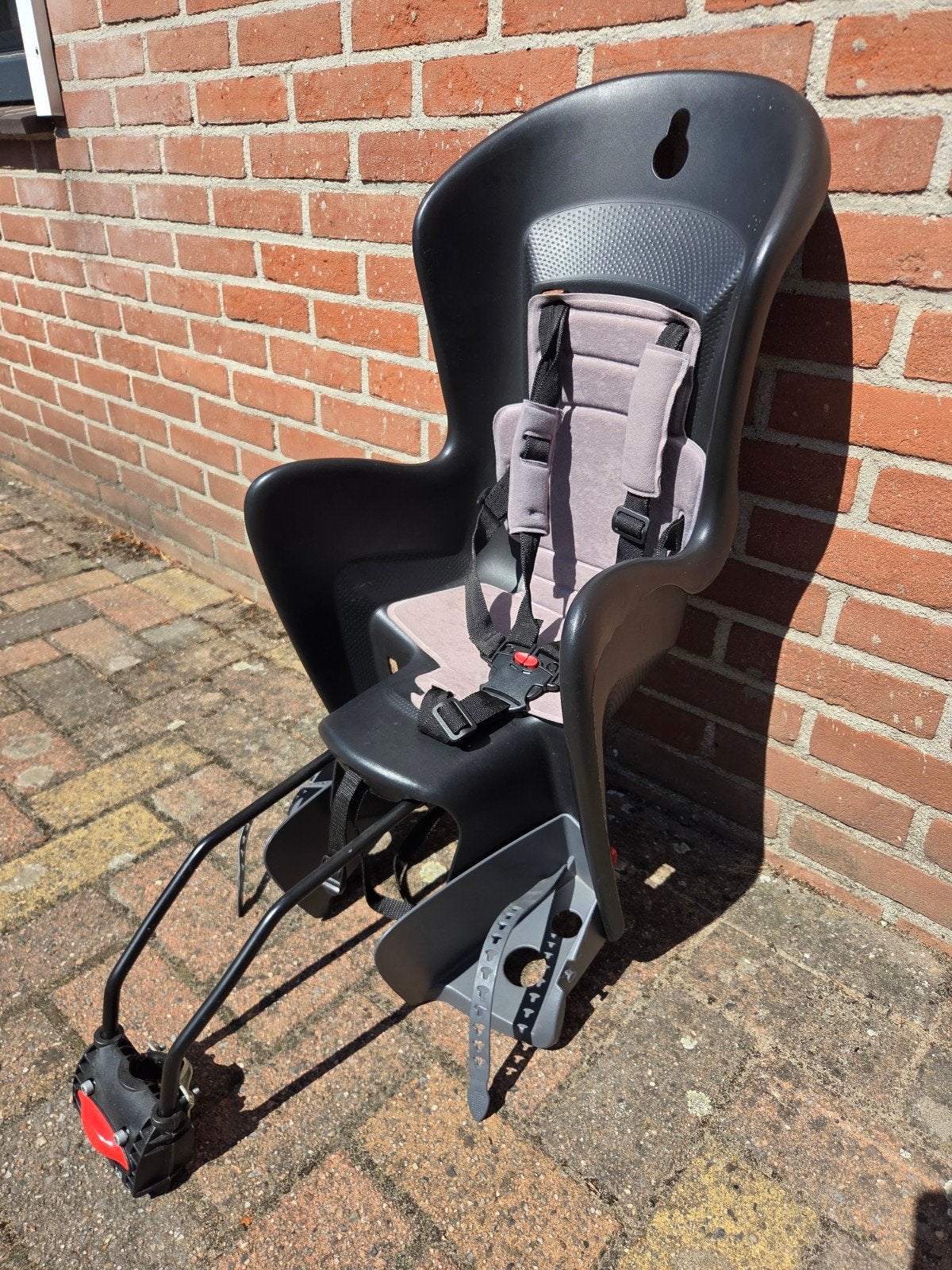 fietsstoeltje voor achterop, Ophalen