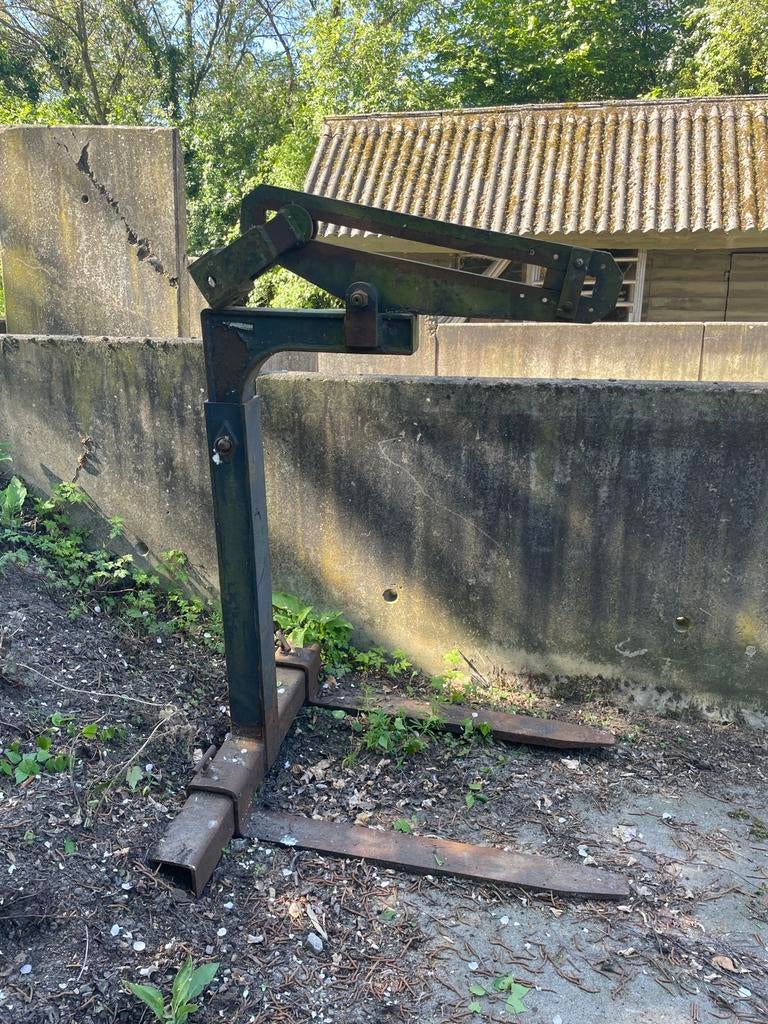 Verachtert palletvork, Ophalen
