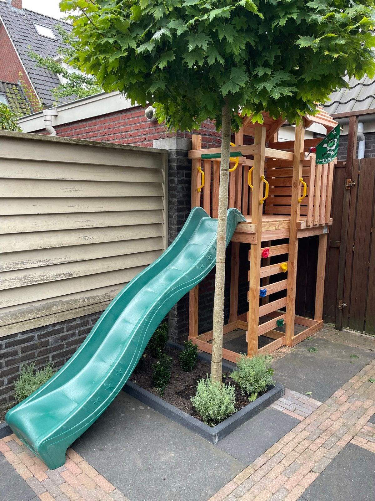 Jungle Gym garden play house with slide, climbing wall, Ophalen, Zo goed als nieuw, Hout