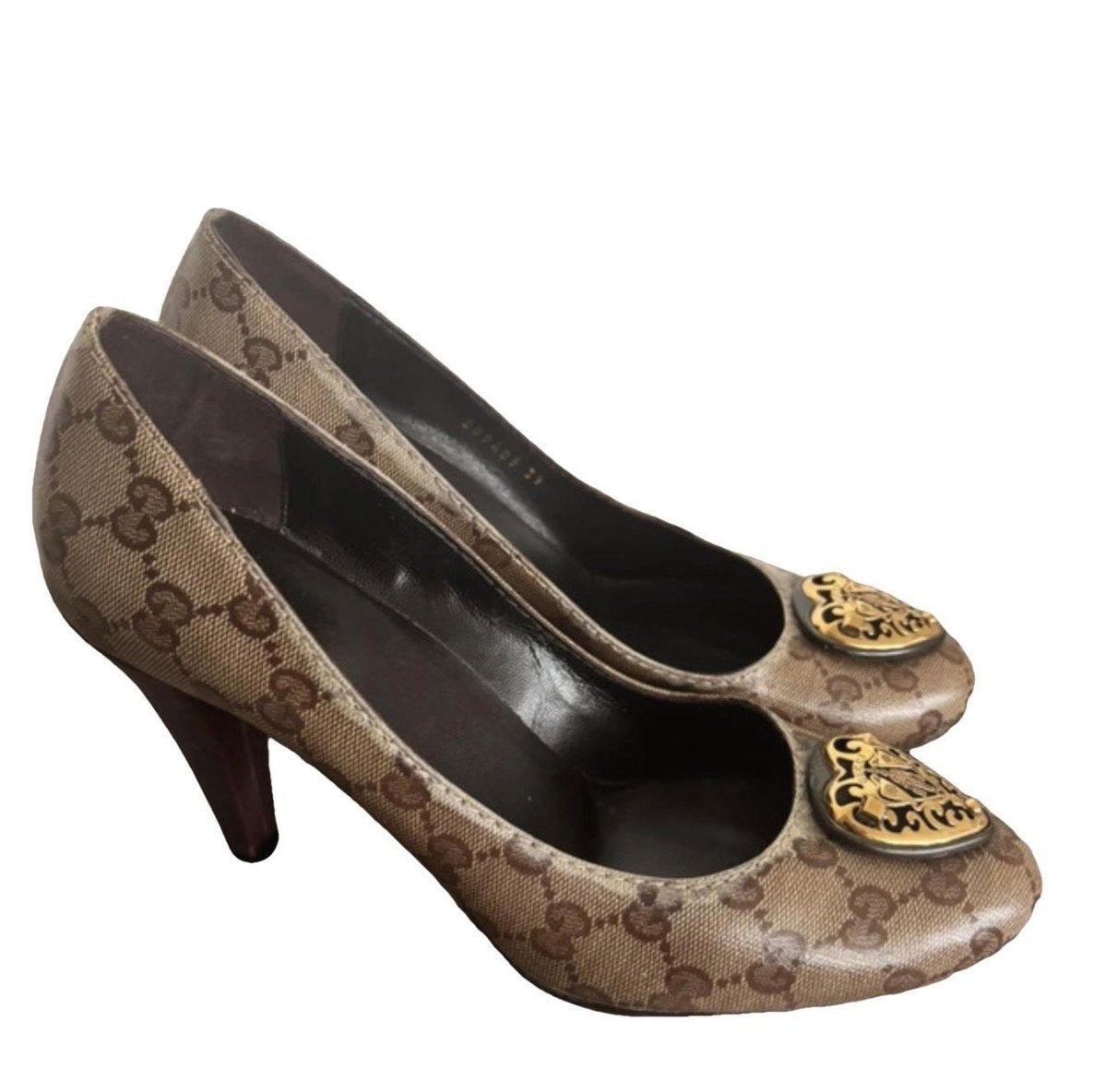 Gucci Pumps met GG-patroon en gouden hartdetails, Ophalen of Verzenden, Gedragen, Bruin, Pumps