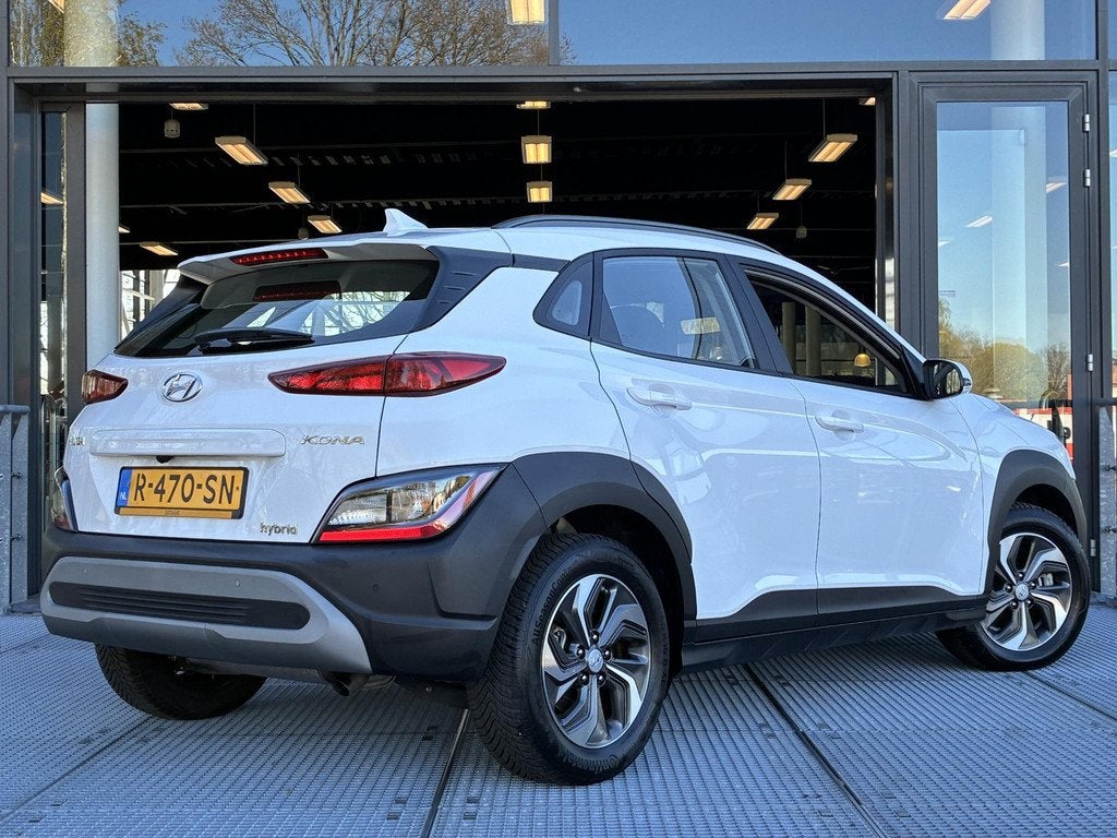 Hyundai Kona 1.6 GDI HEV Comfort Smart Automaat 105PK | Navi, Auto's, Stof, Euro 6, 2 kWh, Wit