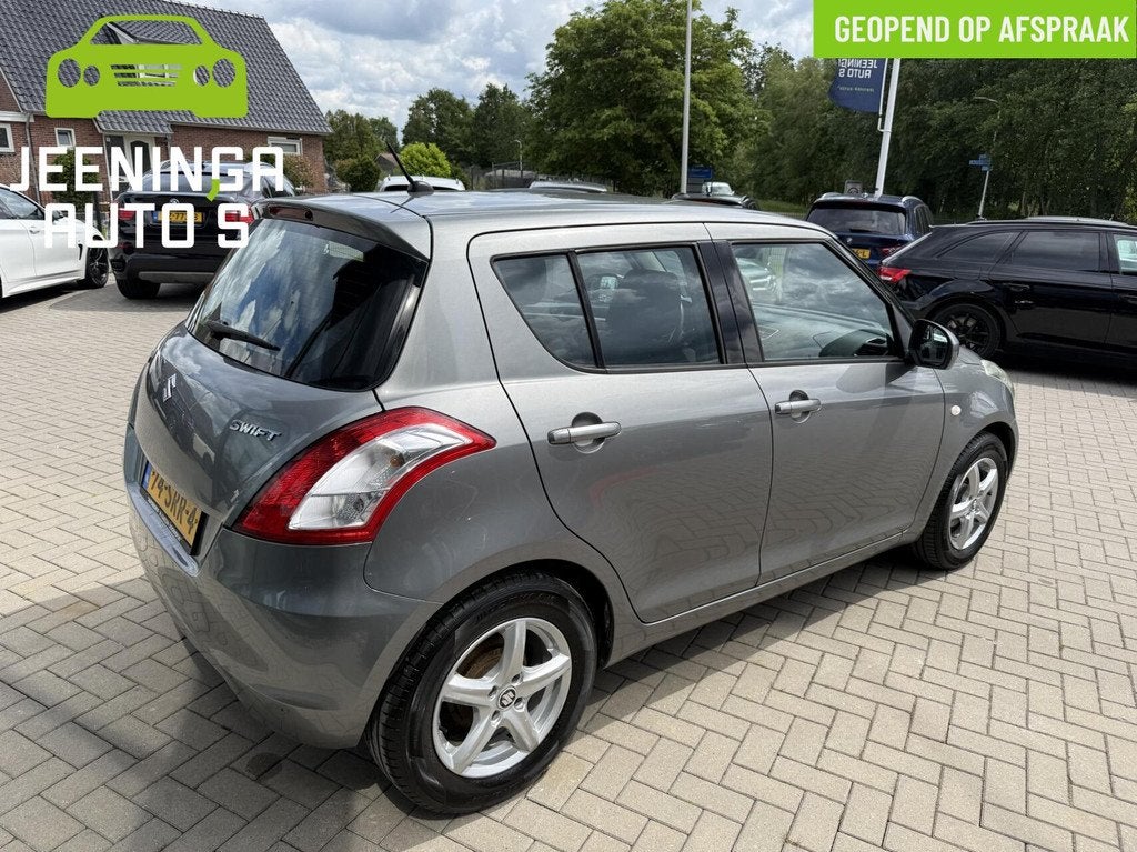 Suzuki Swift 1.2 Comfort|Airco|Stoelverwarming|AppleCarPlay, Voorwielaandrijving, Stof, Gebruikt, 4 cilinders