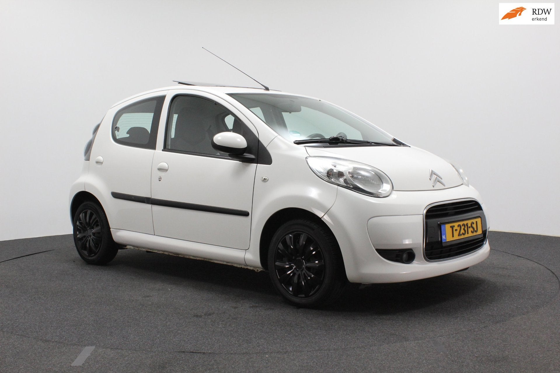 Citroen C1 1.0-12V Exclusive | Airco | Open dak | Elektrisch, Voorwielaandrijving, Euro 5, Gebruikt, 4 stoelen
